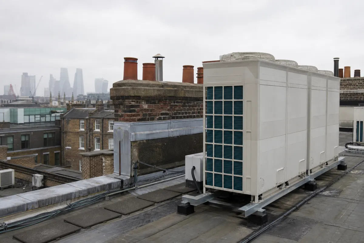 Large commercial VRF outdoor condensers on a London office roof